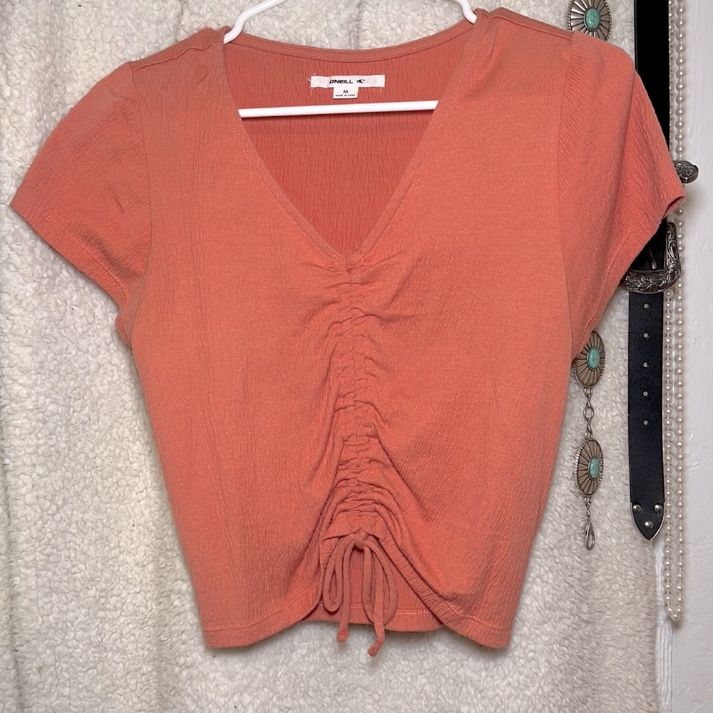 Peach color top size medium